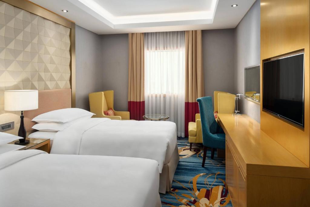 Sheraton 5* ou équivalent