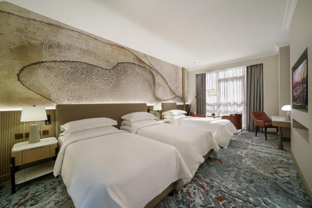 Rotana Al Monakha 4* ou équivalent